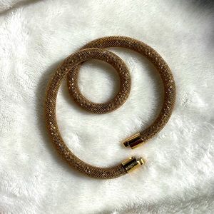 Swarovski netted crystal wrap bracelet in pale Champange gold.